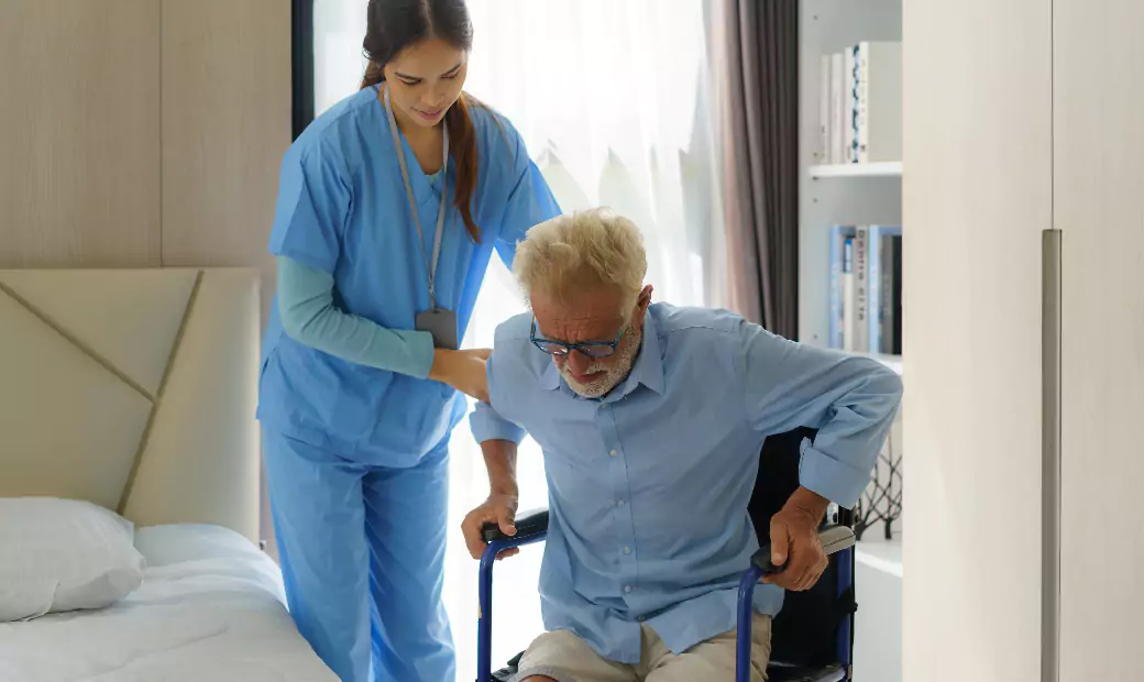 Asian smiling nurse helping senior man get out of bed nursing care support patient