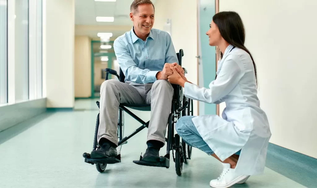 healthcare-professionals-offer-emotional-support-to-patients-in-wheelchairs