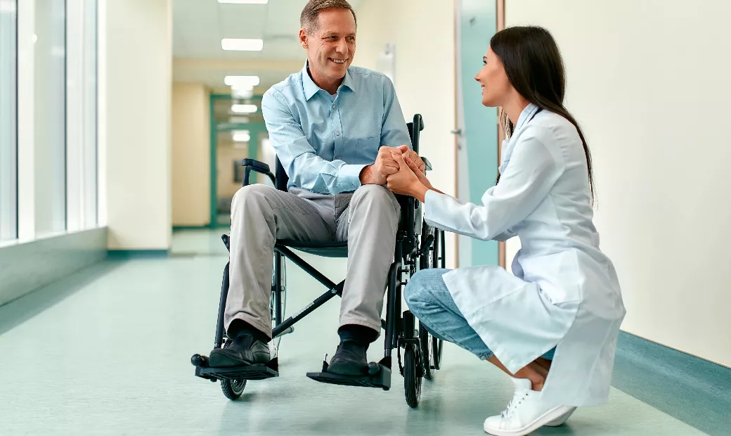 healthcare-professionals-offer-emotional-support-to-patients-in-wheelchairs
